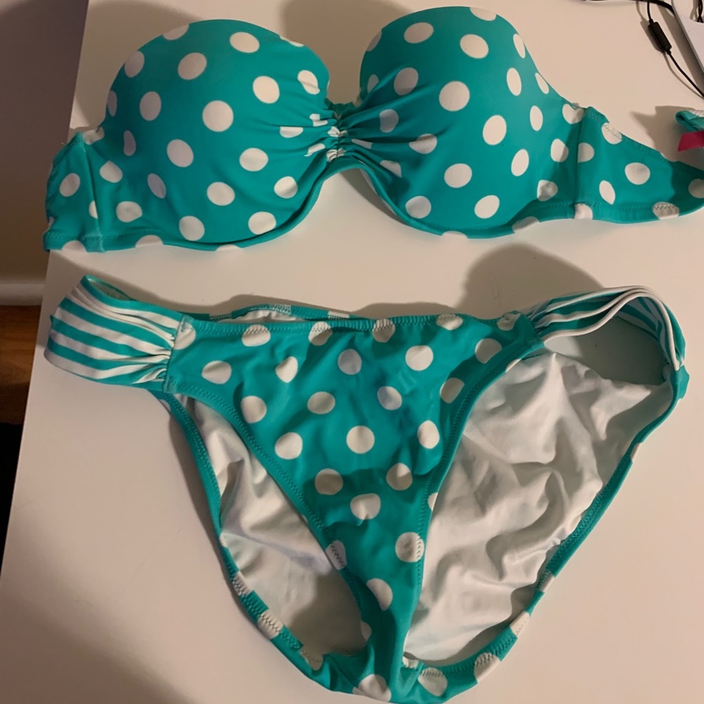 Green polka dot bathing suit